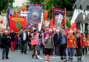 Banners at march First trade union was formed here.