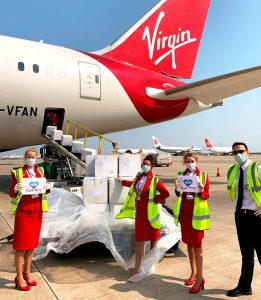 Virgin plane and crew
