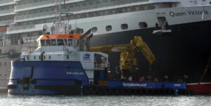 Delta Marine barge reattaching the anchor. 